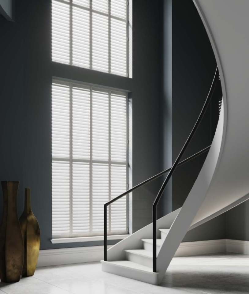 Full length bespoke window shutters with staircase