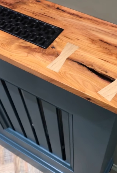 Bespoke wooden radiator cover for a house in Bromley