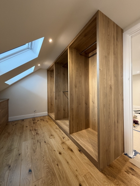 Bespoke hand-made wooden furniture for loft conversion in Beckenham