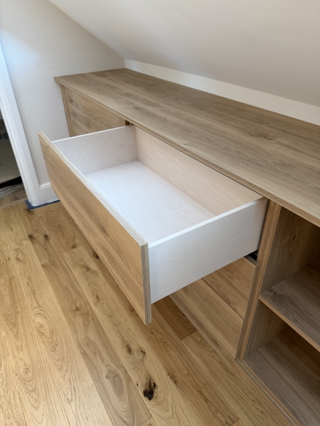 Bespoke hand-made wooden furniture for loft conversion in Beckenham